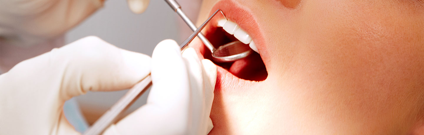 A woman getting dental examination